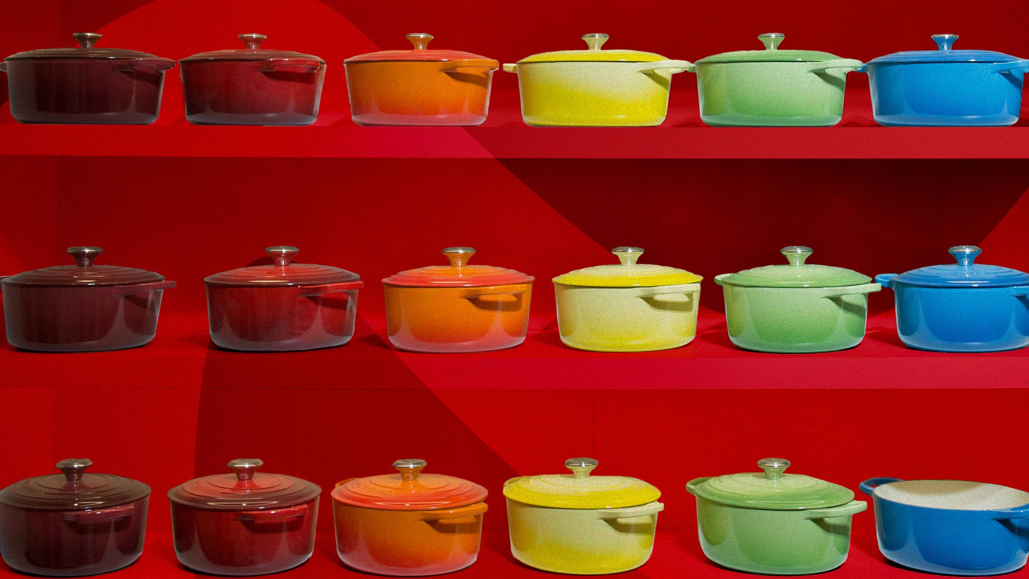 shelves of le creuset cookware
