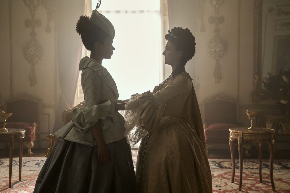 queen charlotte a bridgerton story l to r india amarteifio as young queen charlotte, michelle fairley as princess augusta in episode 101 of queen charlotte a bridgerton story cr liam danielnetflix © 2023
